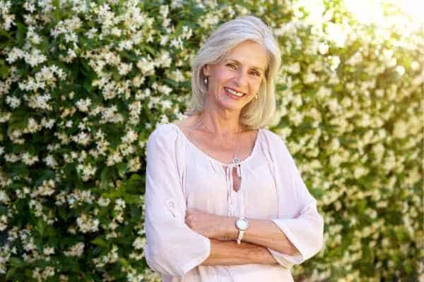Older woman happy with urinary incontinence treatment Harpenden